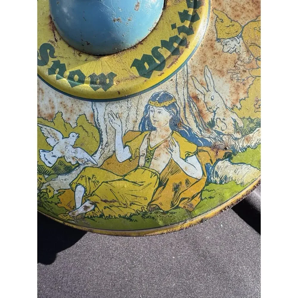 The J CHEIN & Company Early Disney Snow White & 7 Dwarfs Spin Top Tin Needs TLC